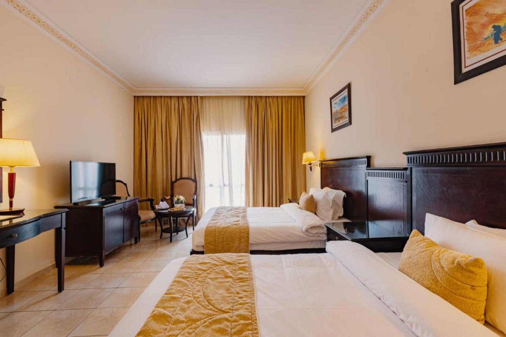 Grand Mogador Agdal & Spa Marrakesch Exterior foto A room at the hotel